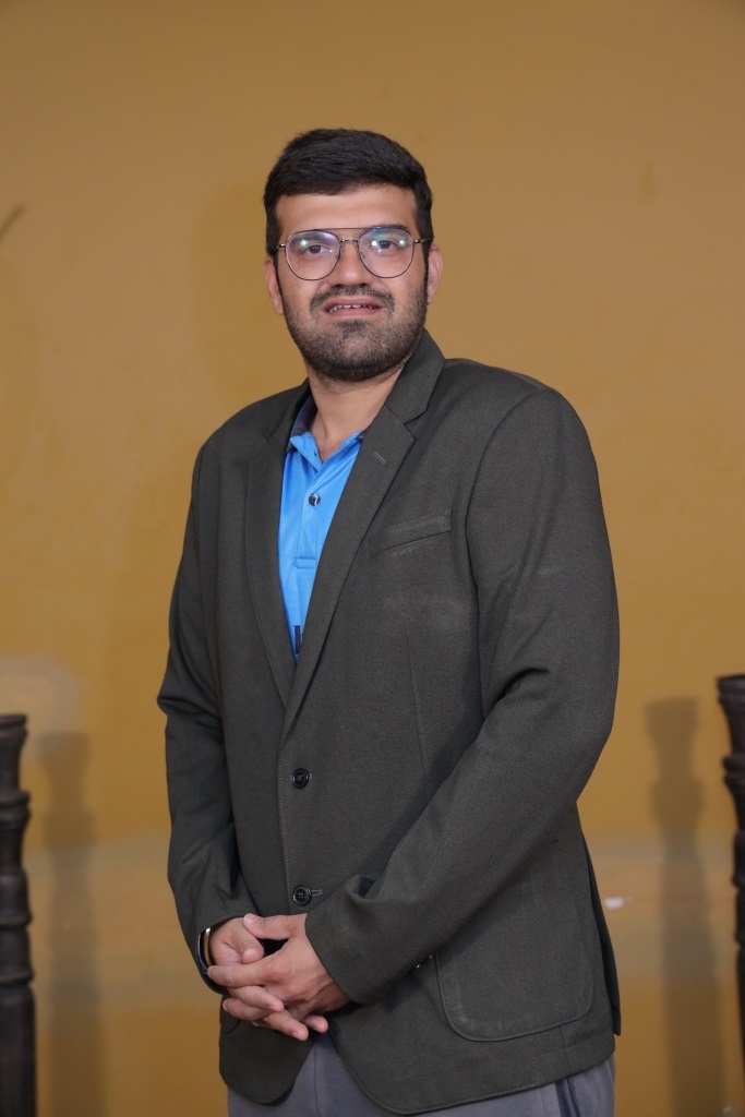Dr. Ajay Charan