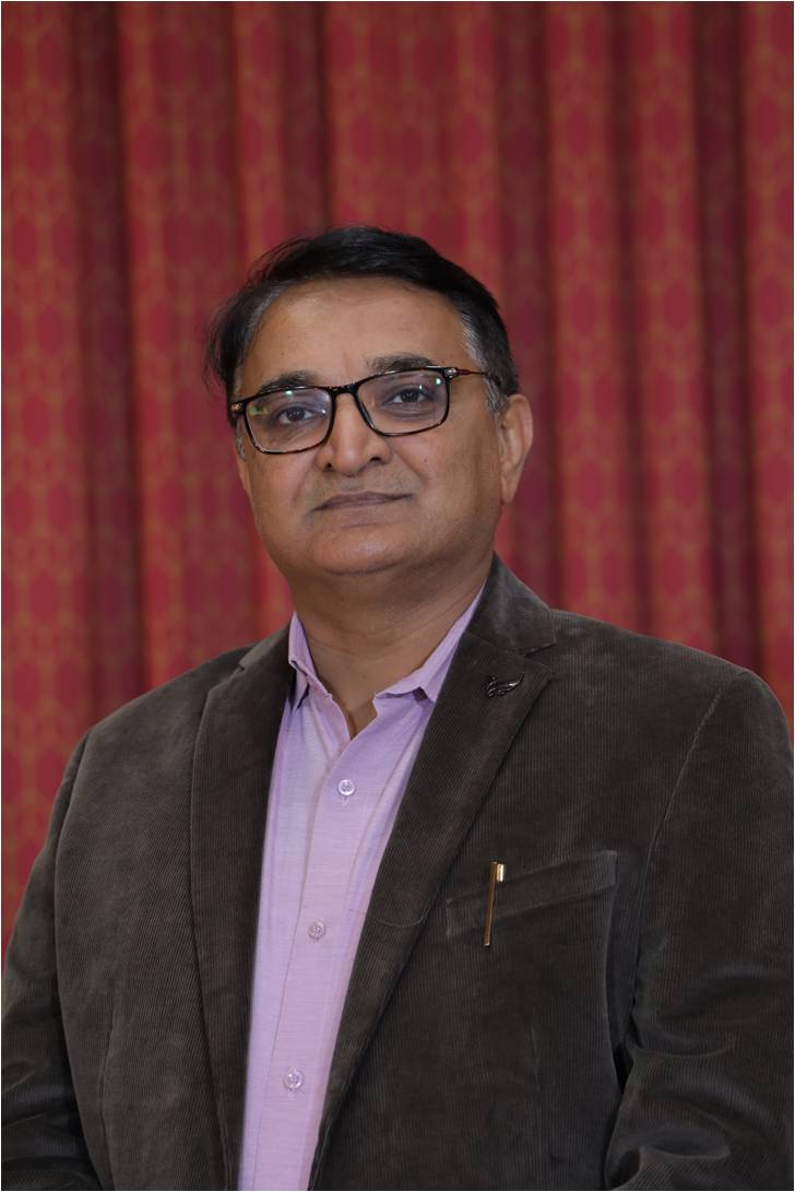 Dr. Tejas Karmata